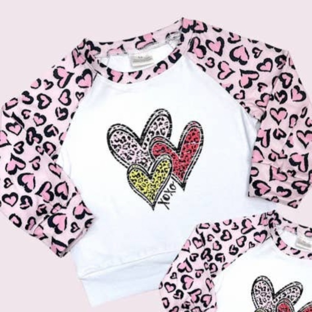 Women’s  Pink, black, yellow, and white heart long sleeve shirt